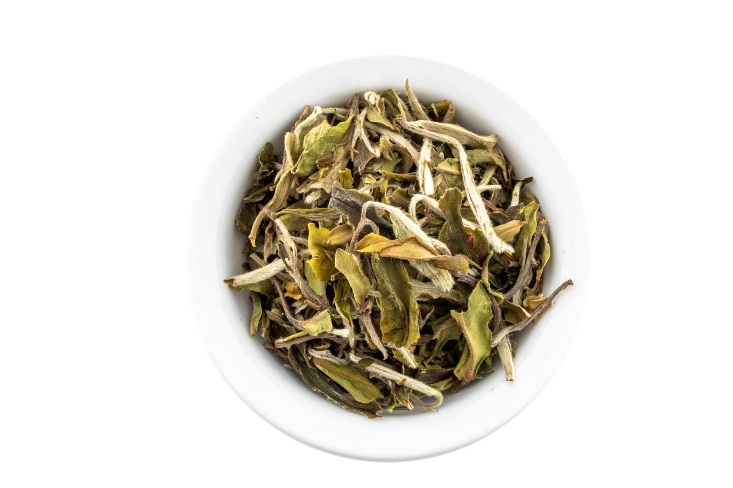 White bowl filled with Bai Mudan white tea on a white background