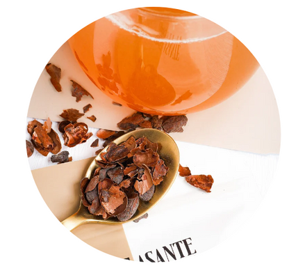 Cocoa Asante chocolate husks beside a prepared black tea www.cocoaasante.com