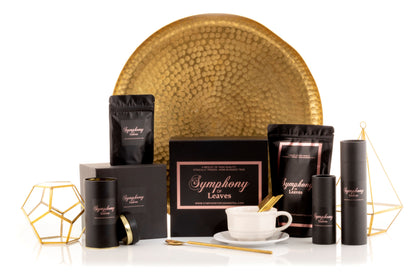 Symphony of Leaves Tea Co. boxes and canisters with a white background