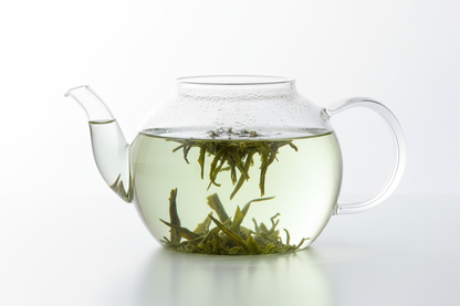 clear tea pot with sencha tea