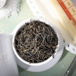 Butter and dried herbs on kitchen table